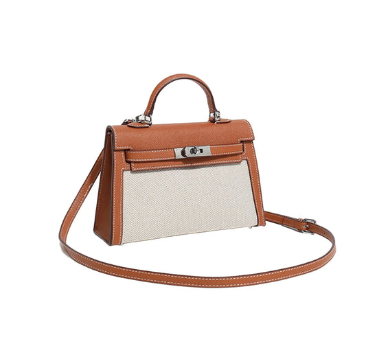 Brown handbag with beige interior on a white background